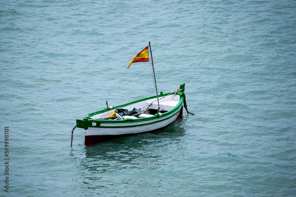 Boats on La Caleta beach in Cadiz, Spain on April 30, 2023