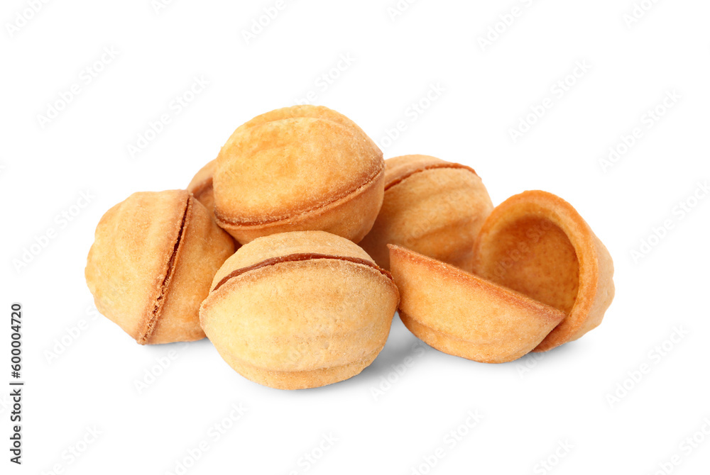Delicious nut shaped cookies with condensed milk on white background Delicious nut shaped cookies with condensed milk on white background
