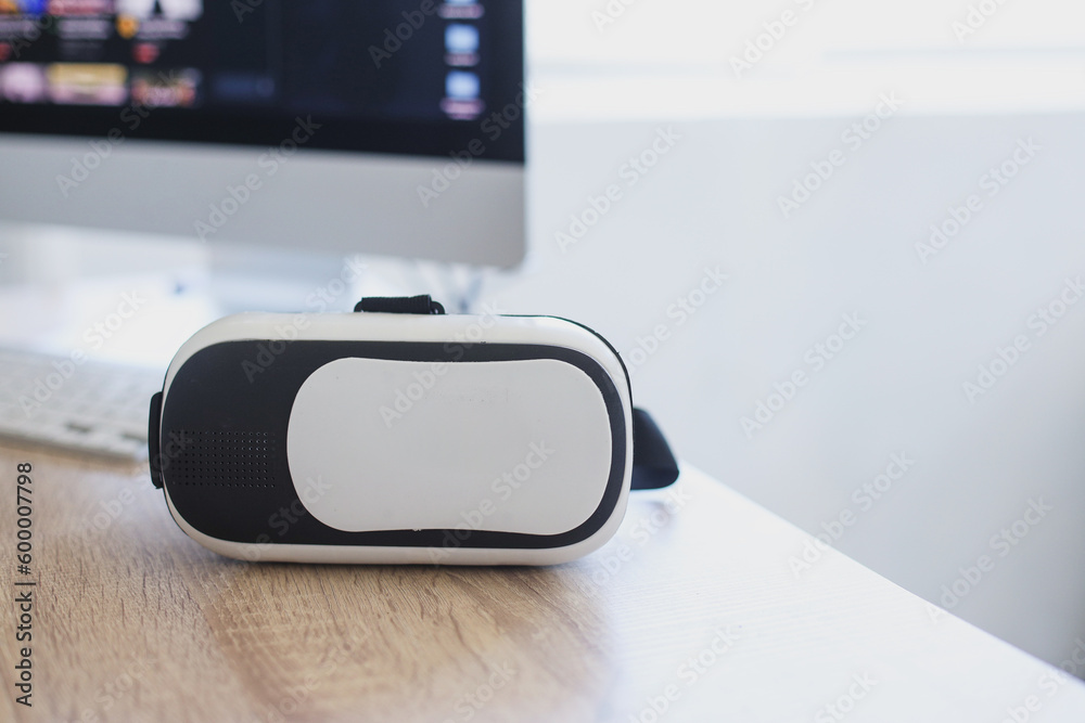 Close-up of VR glasses on wooden table. Mock up and copy space. Close-up of VR glasses on wooden table. Mock up and copy space.