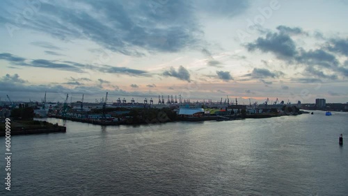 Wallpaper Mural Captivating timelapse of Hamburg's container port terminal and harbor cranes during sunset, showcasing the bustling urban skyline and stunning river views. Torontodigital.ca
