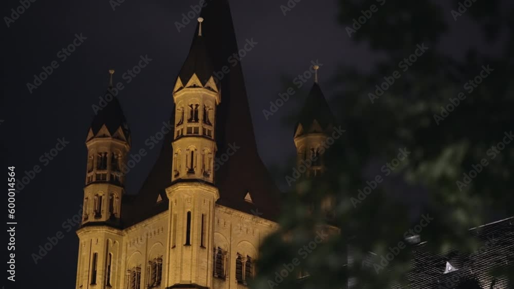 View at the tower of the Church Gross St. Martin in Cologne at night , Germany View at the tower of the Church Gross St. Martin in Cologne at night , Germany