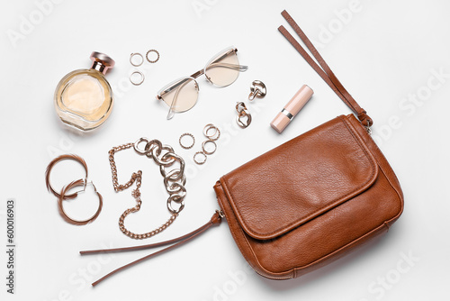 Composition with stylish female accessories isolated on white background
