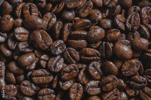Roasted coffee beans close up background