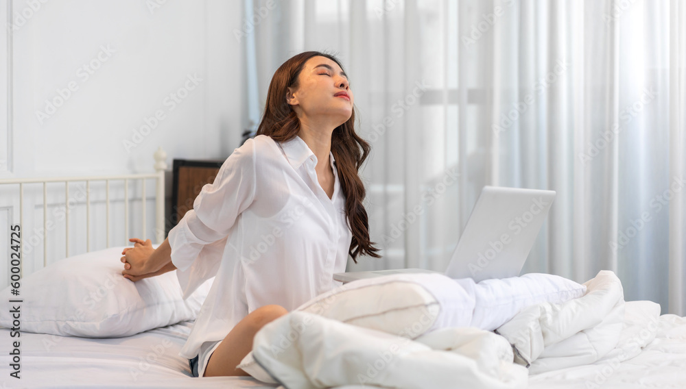 Portrait of smiling beauty pretty asian woman comfortable fresh healthy smile happy and relax in pajamas white clothes, happy calm, resting, breathing fresh air.Girl felling wellbeing enjoy at home Portrait of smiling beauty pretty asian woman comfortable fresh healthy smile happy and relax in pajamas white clothes, happy calm, resting, breathing fresh air.Girl felling wellbeing enjoy at home