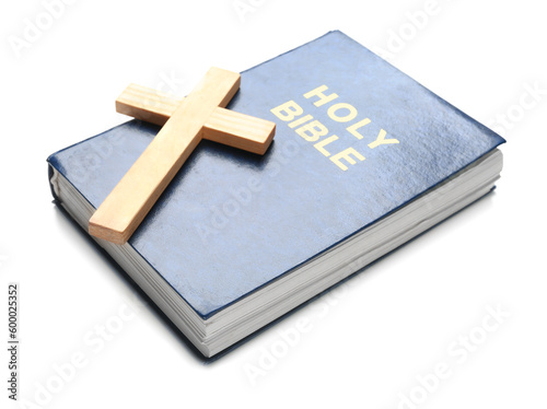 Holy Bible and wooden cross isolated on white background