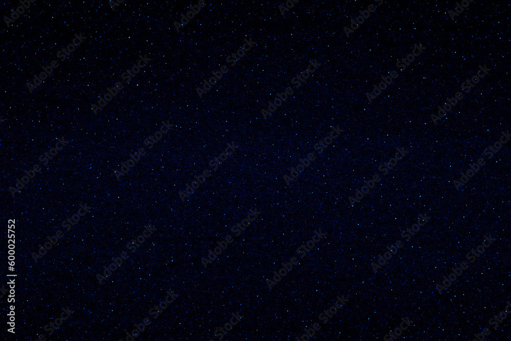 Starry night sky.  Glowing stars in the night.  Dark blue galaxy space background. 