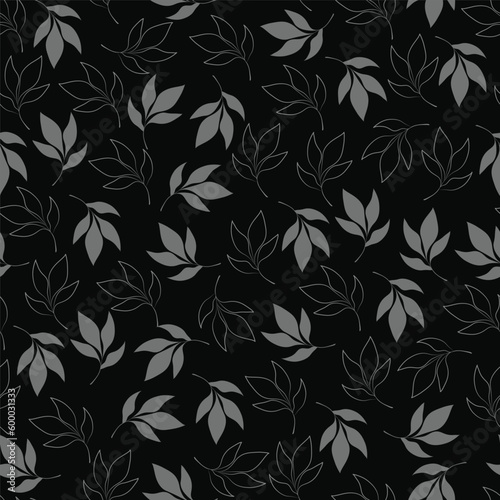 A black and silver pattern with leaves on a black background