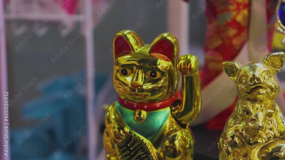 Estatua de gato de la suerte, barrio chino de la ciudad