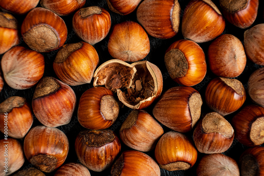 pile of hazelnuts with shells full frame close-up background pile of hazelnuts with shells full frame close-up background