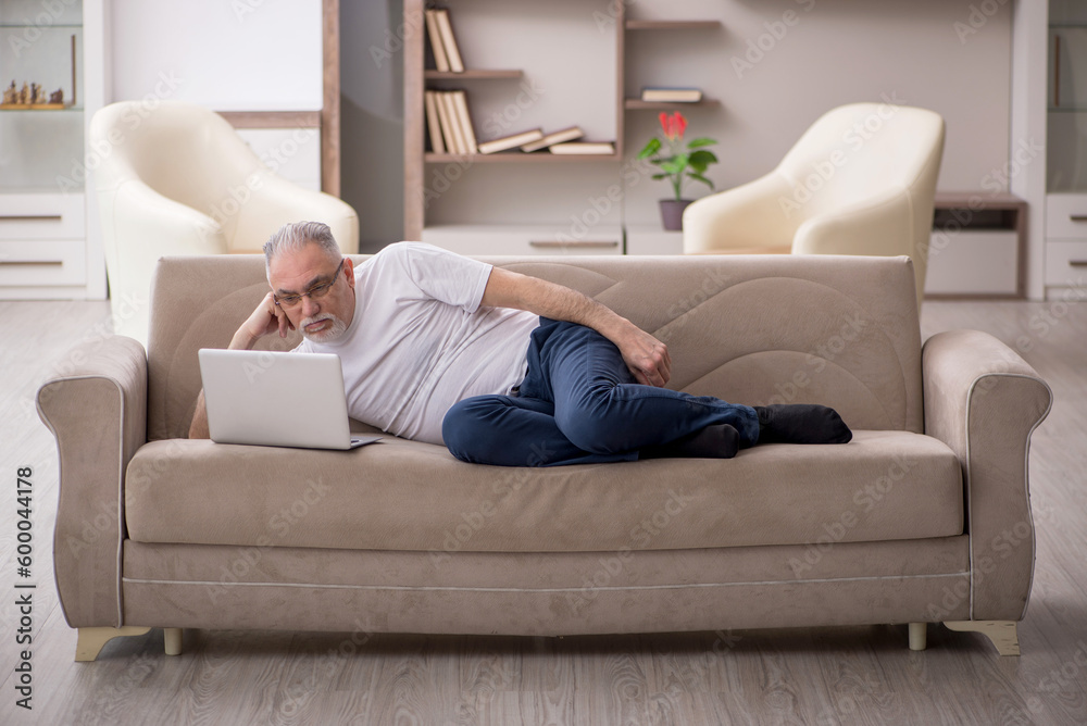 Old man sitting at home Old man sitting at home