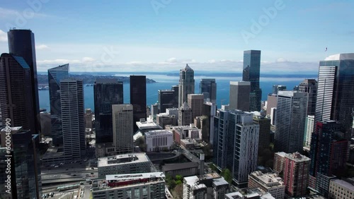 Blue Sky Aerial of Seattle Skyline with Ocean Background