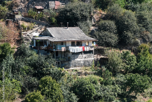 View of traditional Armenian rural house on sunny summer day. Akhtala village, Lori Province, Armenia. photo