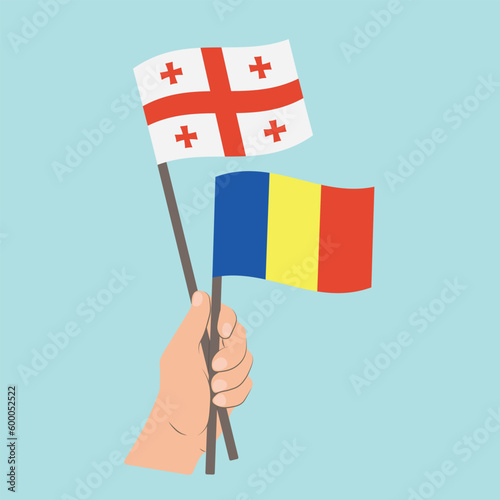 Flags of Georgia and Romania, Hand Holding flags