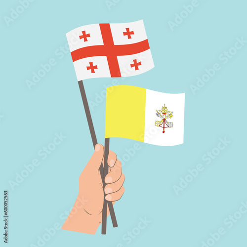 Flags of Georgia and Vatican City, Hand Holding flags