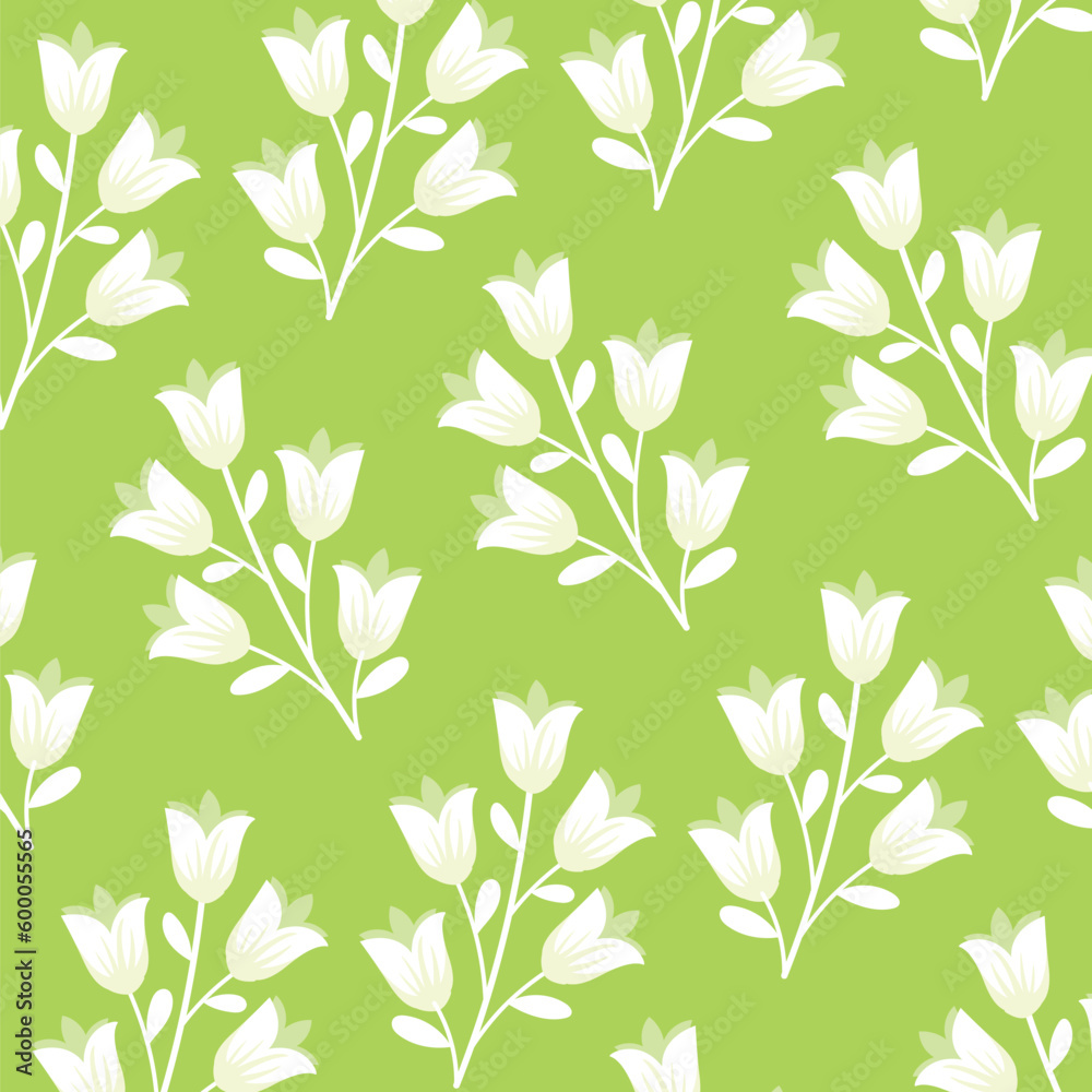 White flowers on a green background

