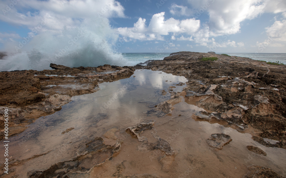 Waves crashing on Laie Point coastline at Kaawa on the North Shore of Oahu Hawaii United States Waves crashing on Laie Point coastline at Kaawa on the North Shore of Oahu Hawaii United States