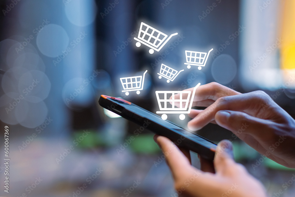 woman using smartphone shopping online, shopping cart icon on screen mobile phone. purchase payment on internet. online supermarket gadget. - obrazy, fototapety, plakaty 