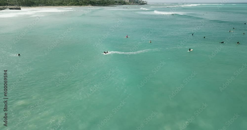 Black female surfer riding a wave Black female surfer riding a wave