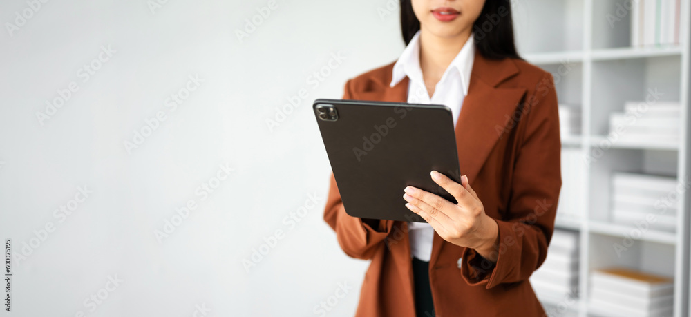 Businesswoman using mobile phone, tablet.Closeup on white background can use for product presenting concept.. Businesswoman using mobile phone, tablet.Closeup on white background can use for product presenting concept..