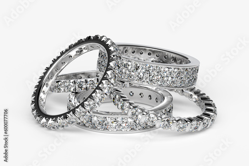 Multiple diamond eternity rings on white background. 3d rendering