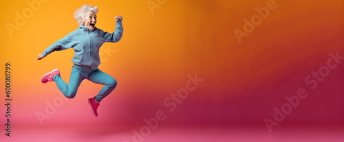 Modern Aging. A playful, energetic portrait of an older woman in workout clothes jumping for joy on a colorful gradient background. Generative AI
