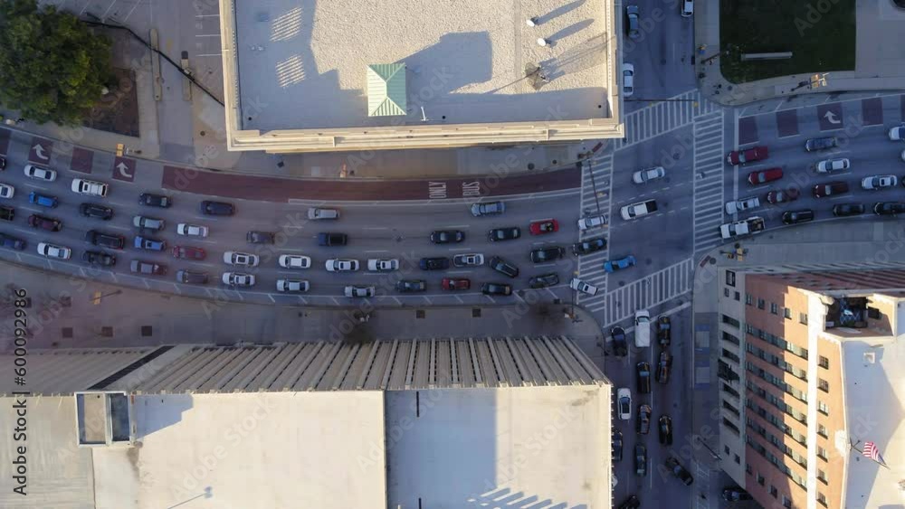 Aerial Panning Shot Of Cars On Road Amidst Buildings In City - Baltimore, Maryland Aerial Panning Shot Of Cars On Road Amidst Buildings In City - Baltimore, Maryland