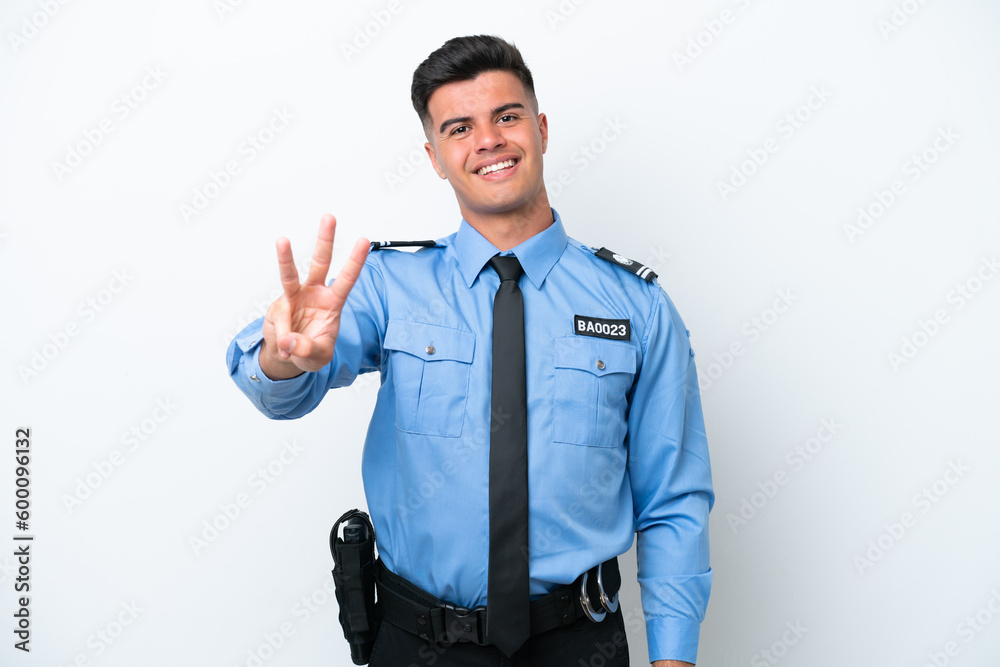 Young police caucasian man isolated on white background happy and counting three with fingers Young police caucasian man isolated on white background happy and counting three with fingers