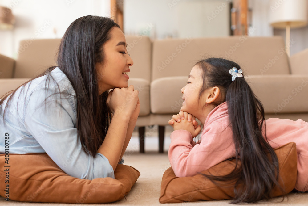 Happy Japanese Mom And Daughter Talking Enjoying Moment At Home Happy Japanese Mom And Daughter Talking Enjoying Moment At Home