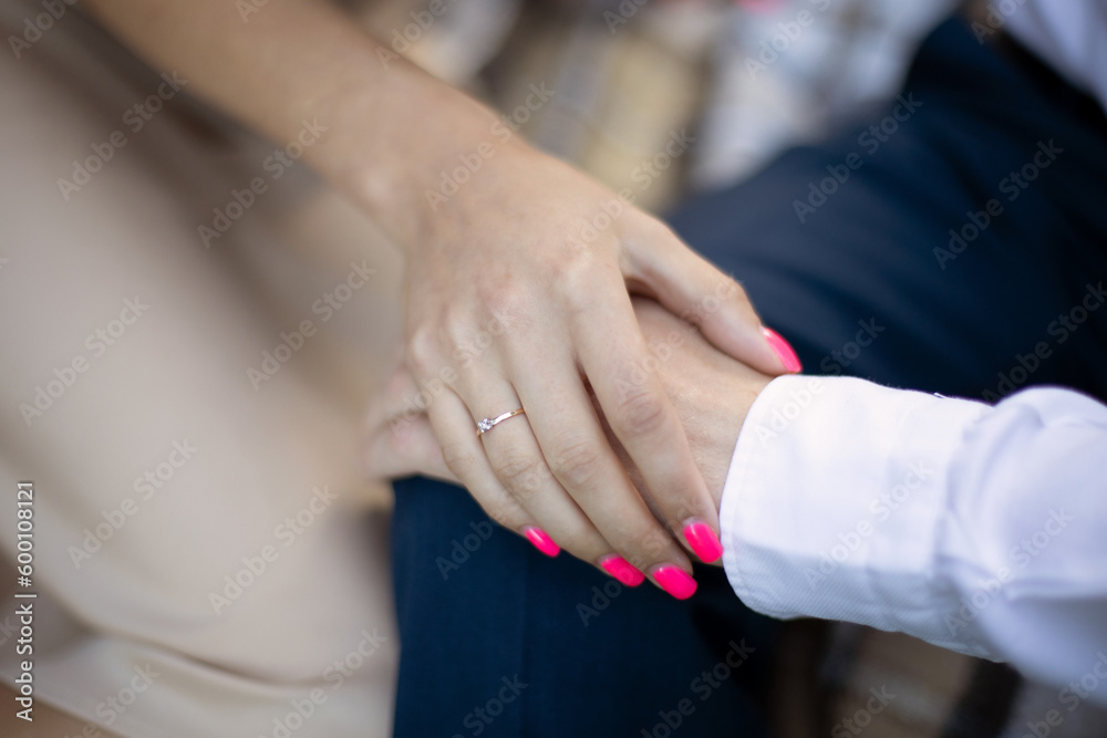 Wedding day. Hands of bride and groom together. Ceremony, love. Close up of hands