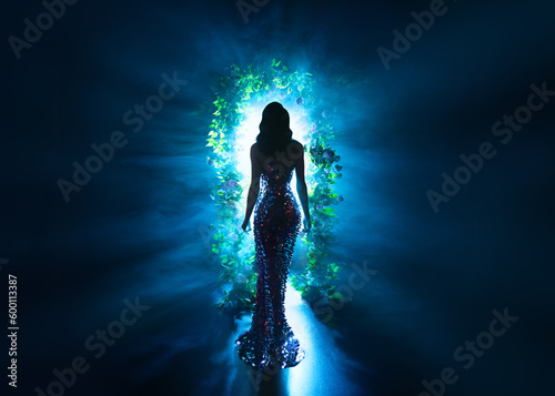 Canvas Print dark shadow silhouette fantasy woman walking in black night garden in fog glowing portal arch flowers, art neon blue magic light