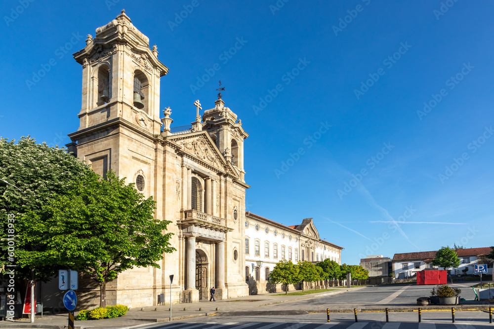 Populo Church in Mannerist and rococo and neoclassical architecture style in Braga Portugal in early morning light with convento do populo beside