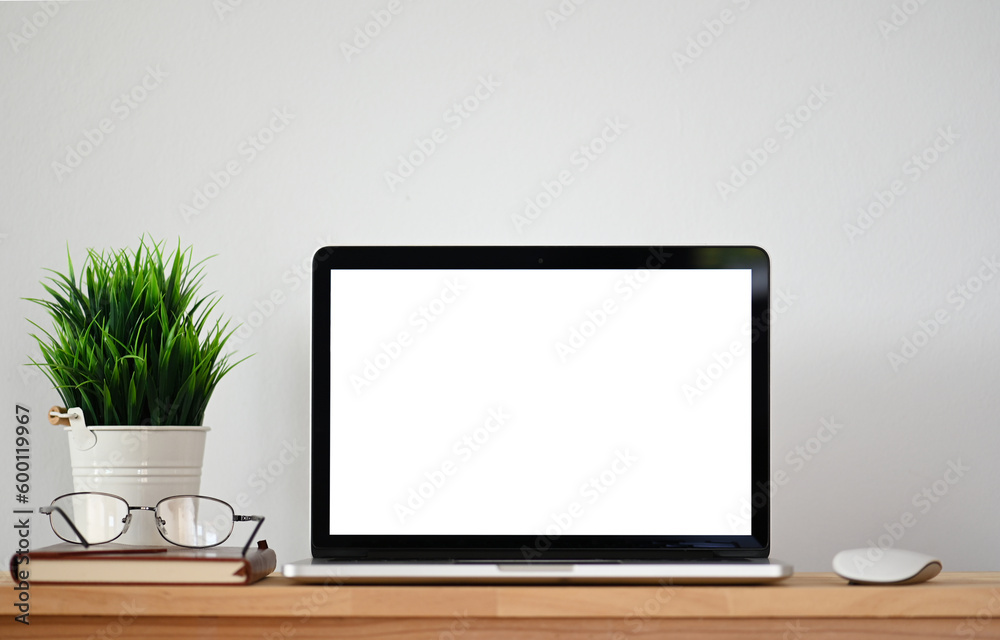 Laptop computer with blank screen in the office Laptop computer with blank screen in the office