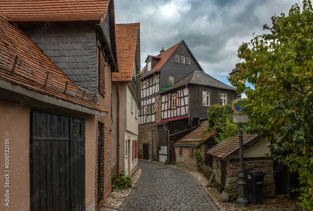 small street with half timbered houses in the historical old town, Kronberg im Taunus, Germany