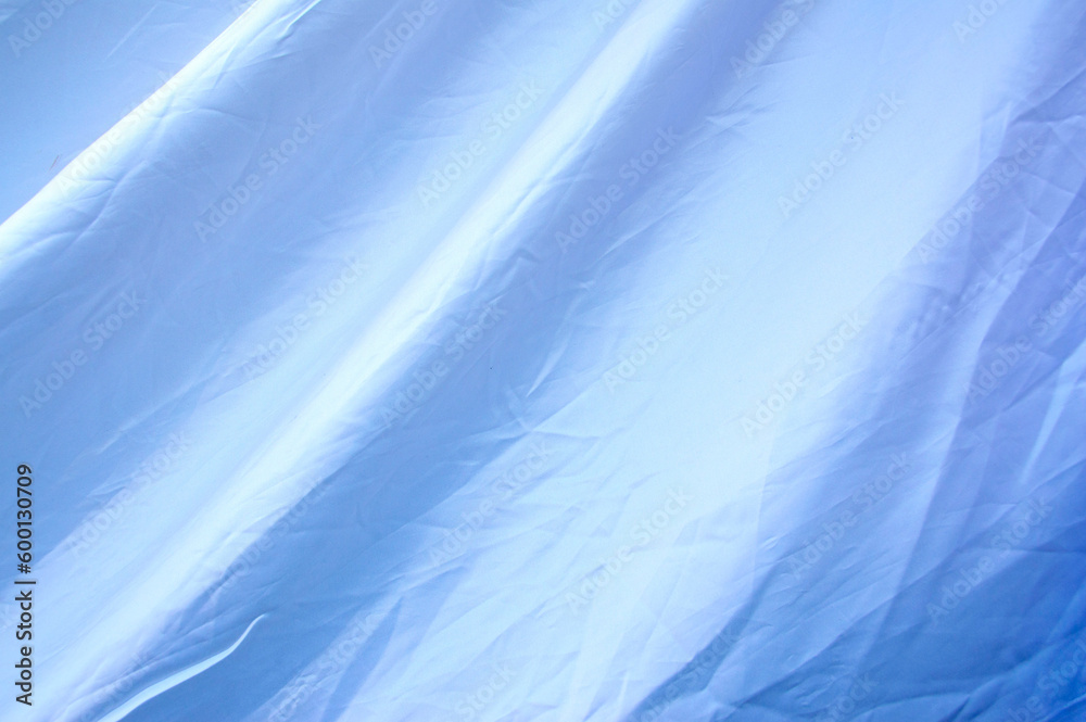 Obraz premium White fabric with wrinkles and one background