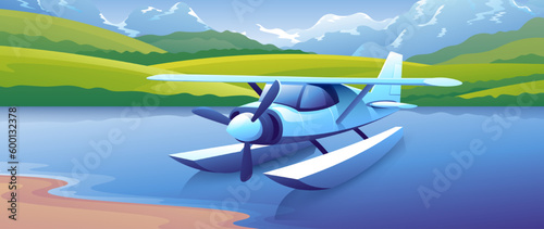Beautiful blue hydroplane floats on the water on the island and the majestic mountains background. photo