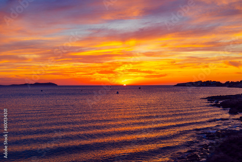 Sunset at Saint Antonio de Portmany - Ibiza. Sunset at Ibiza with beautiful skies over the ocean