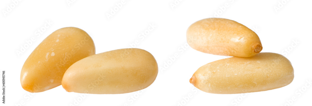 Obraz premium Roasted pine nuts isolated on the white background.