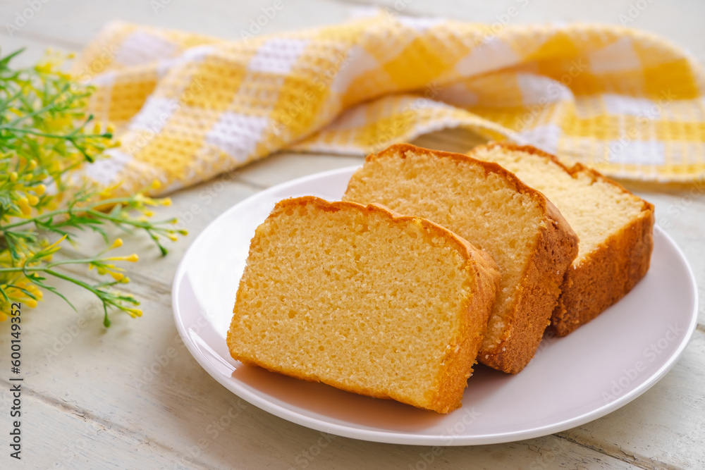 Butter cake sliced on white plate Butter cake sliced on white plate
