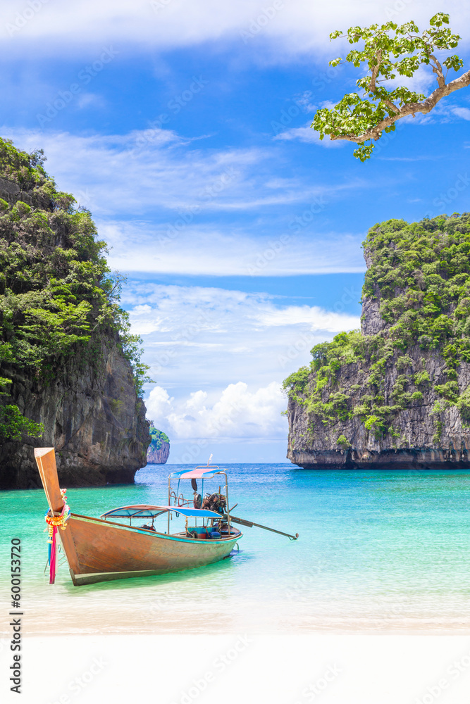 The Thai traditional wooden longtail boat and beautiful beach in Phuket province, Thailand. - obrazy, fototapety, plakaty 
