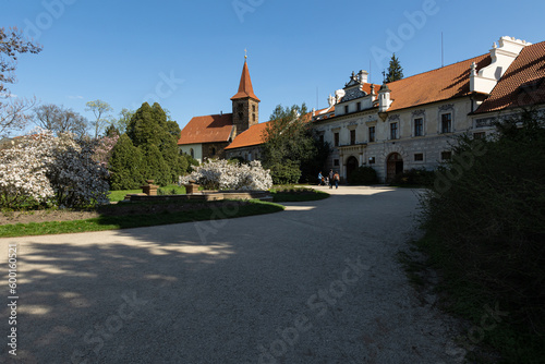 general view of the courtyard of Pruhonytsky Castle 19. Building with red roofs