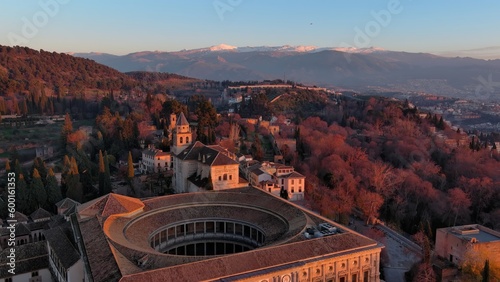 Aerial view of the famous Alhambra palace and fortress at sunset, in Granada, Andalusia, Spain