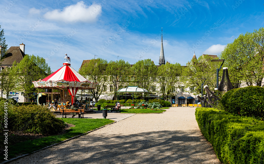 Fototapeta premium Children's carousel at Place Carnot in Beaune, Burgundy, France.