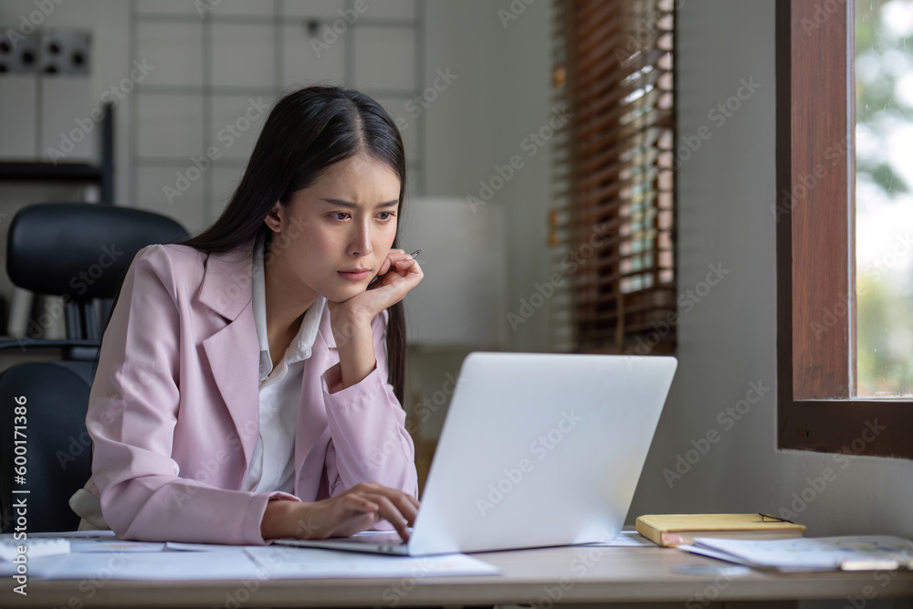Tired asian business woman with headache at office, feeling sick at work, copy space Tired asian business woman with headache at office, feeling sick at work, copy space
