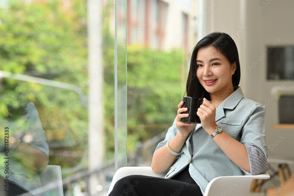 Portrait with Smiling of Young Asian Businesswoman enjoy with coffee. Portrait with Smiling of Young Asian Businesswoman enjoy with coffee.