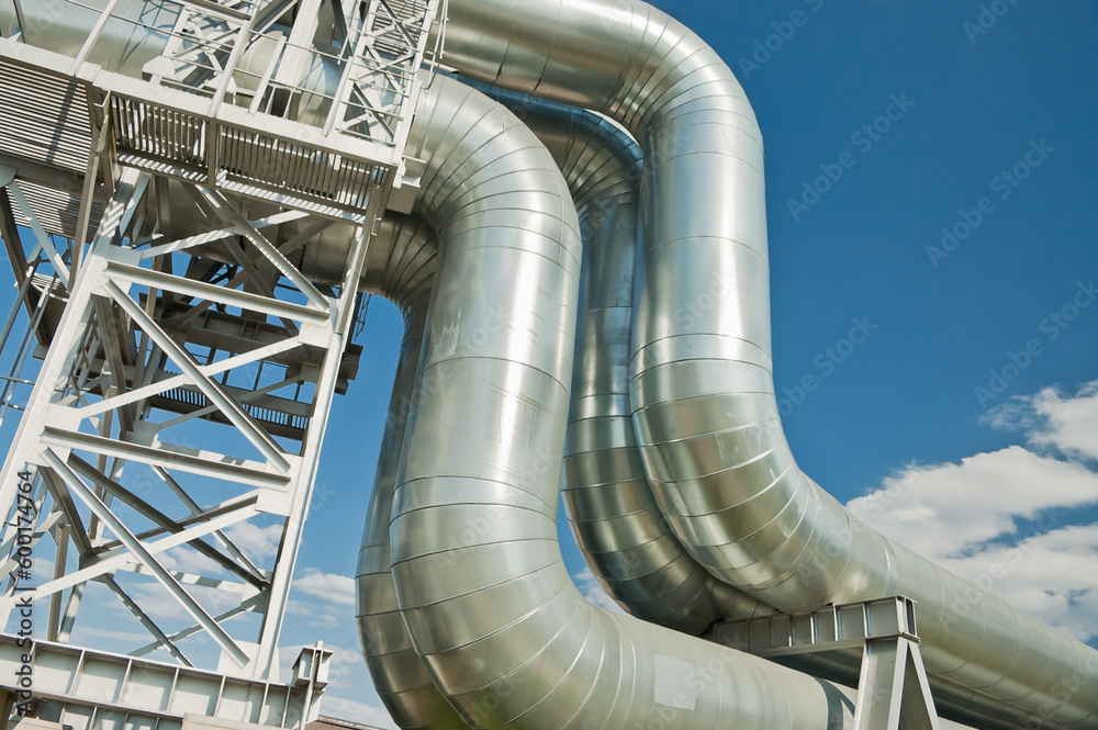 pipeline close-up in the background blue sky and clouds pipeline close-up in the background blue sky and clouds