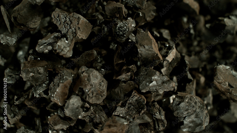 Flying coal with up in the air, top view shot. Flying coal with up in the air, top view shot.