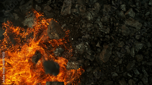 Burning coal with fire, top view shot.