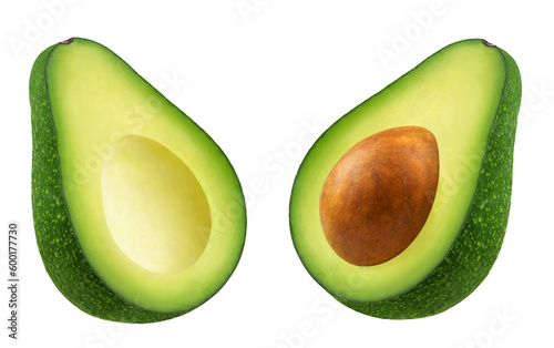 Two halves of a green avocado and the core of the fruit levitate on a transparent background.