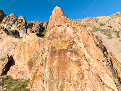 Tamgaly-Tas (Painted Rocks or Stones with Signs) with rock paintings of Tibetan iconography and inscriptions dated to the second half of the 17th century. photo