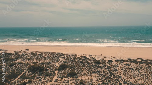 Aerial view of long sandy beach in Castela Velha in Portugal